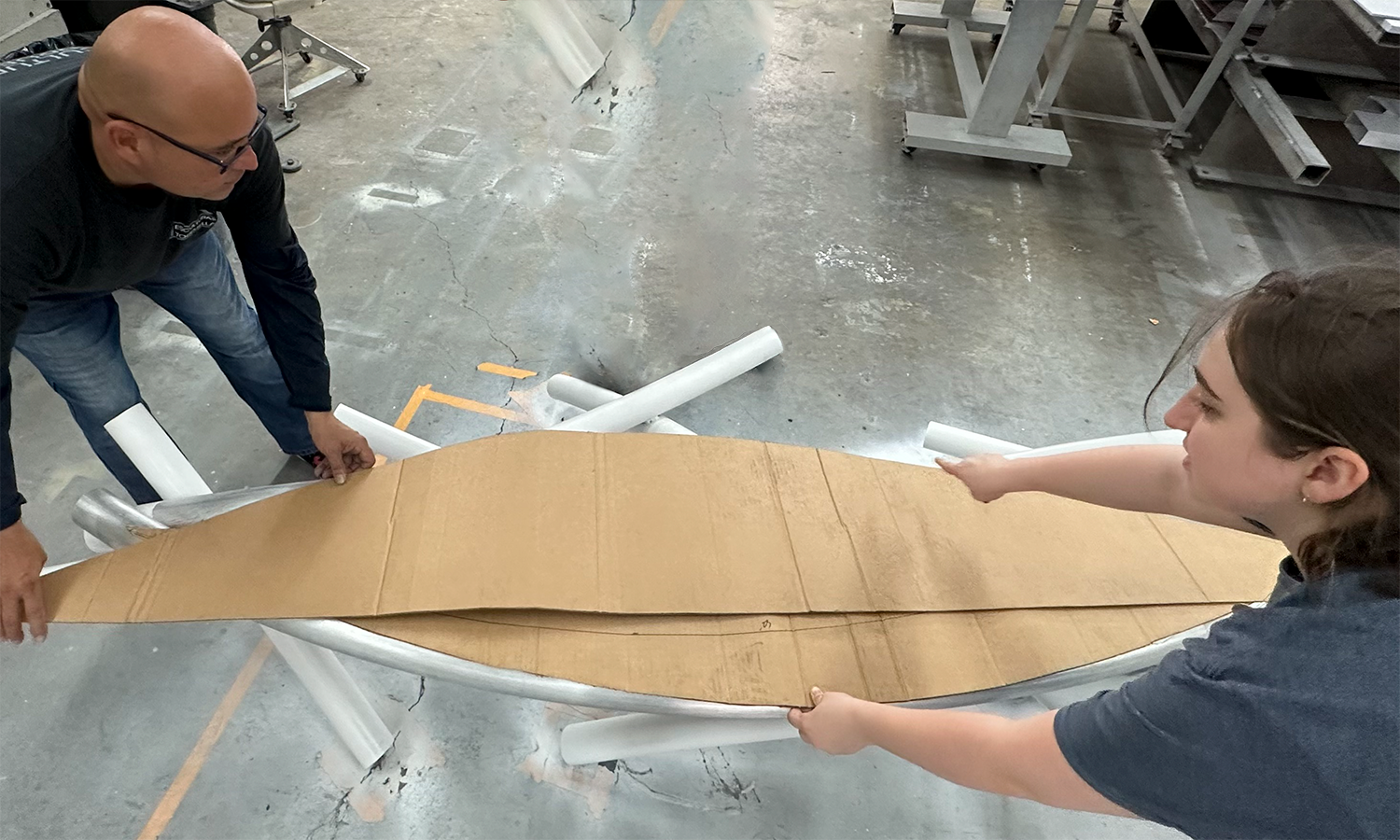 Sisson working on the top future sculpture's bench.