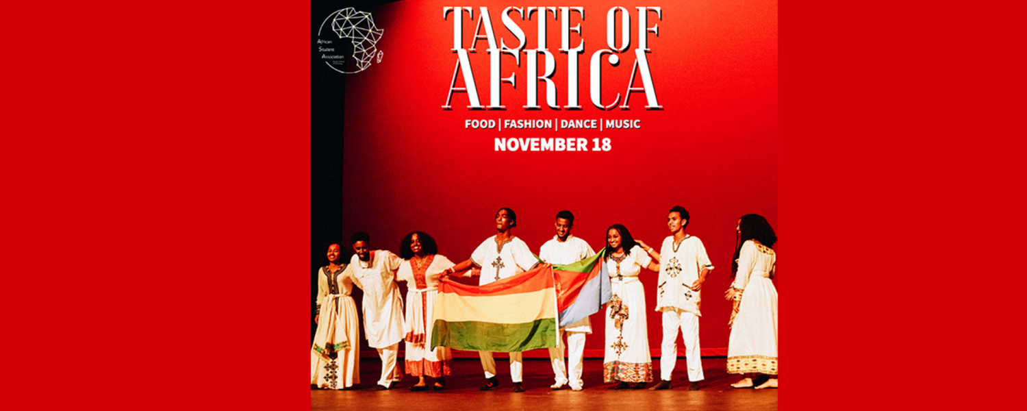 A group of performers stand on a stage in front of a red background. Taste Of Africa November 18 Georgia Tech Ferst Theater.