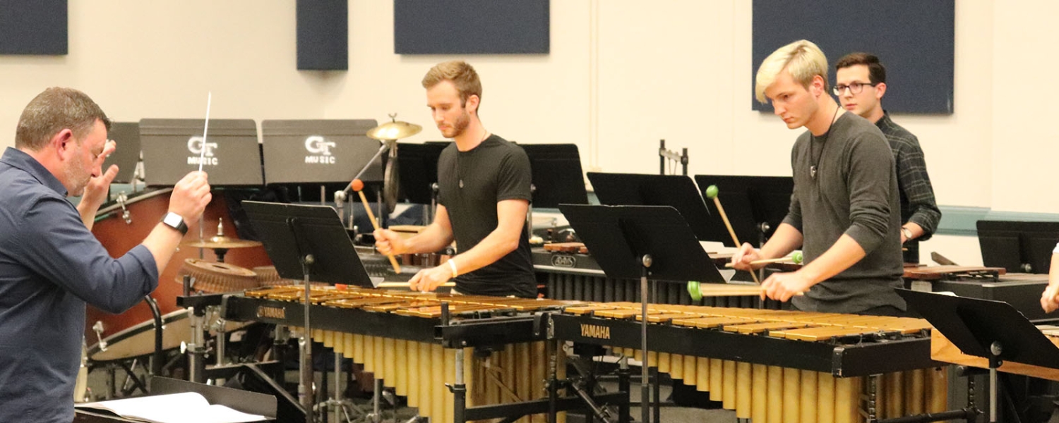 Members of the Georgia Tech Percussion Ensembles practice under the direction of Chris Moore.