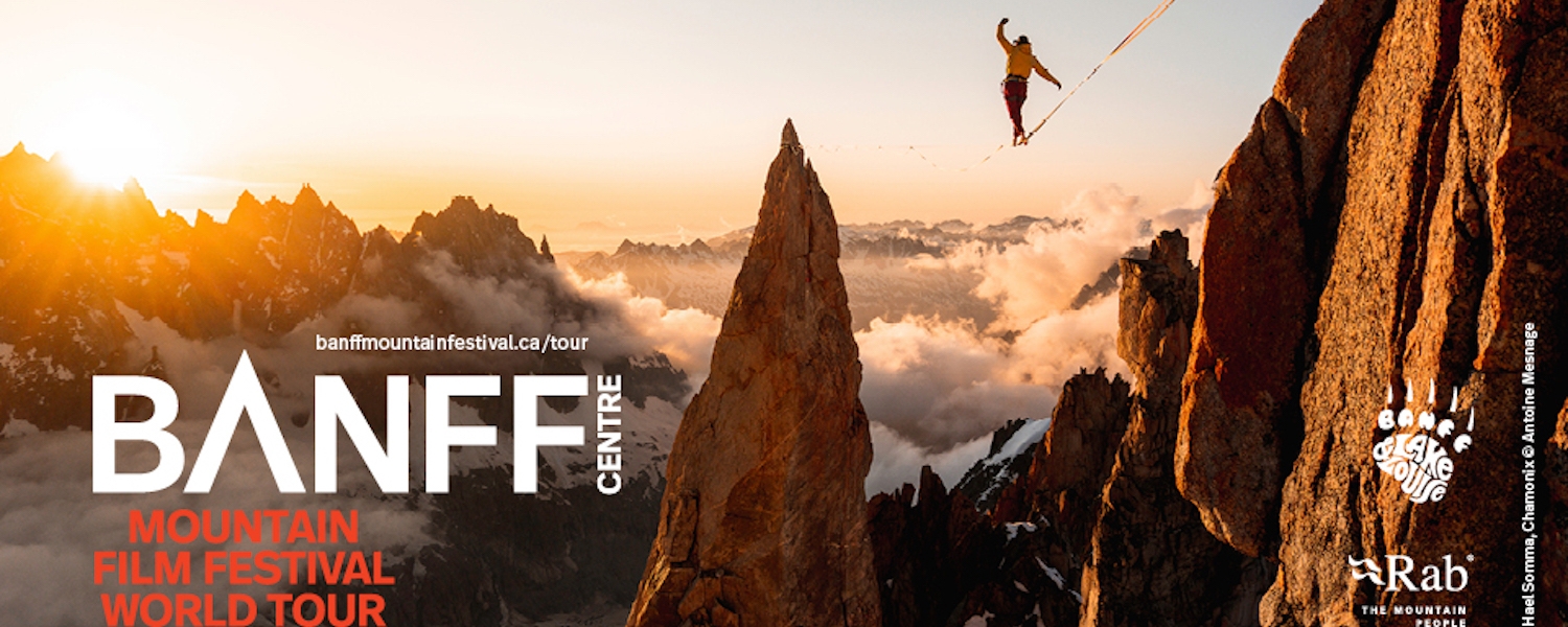 photo of sunsetting on mountain range with person walking between peaks; text reading BANFF mountain film festival world tour