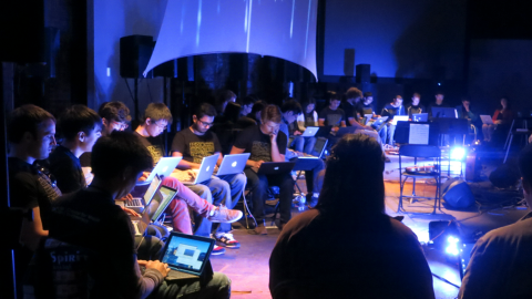 Georgia Tech Laptop Orchestra and New Music Ensemble during a performance.