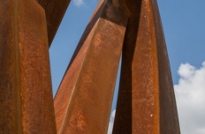 Weathered Steel spikes reaching up and out at different intervals and angles