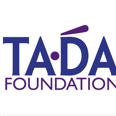 In big bold typeface, the letters TA and DA separated by a dot, and the word FOUNDATION below it